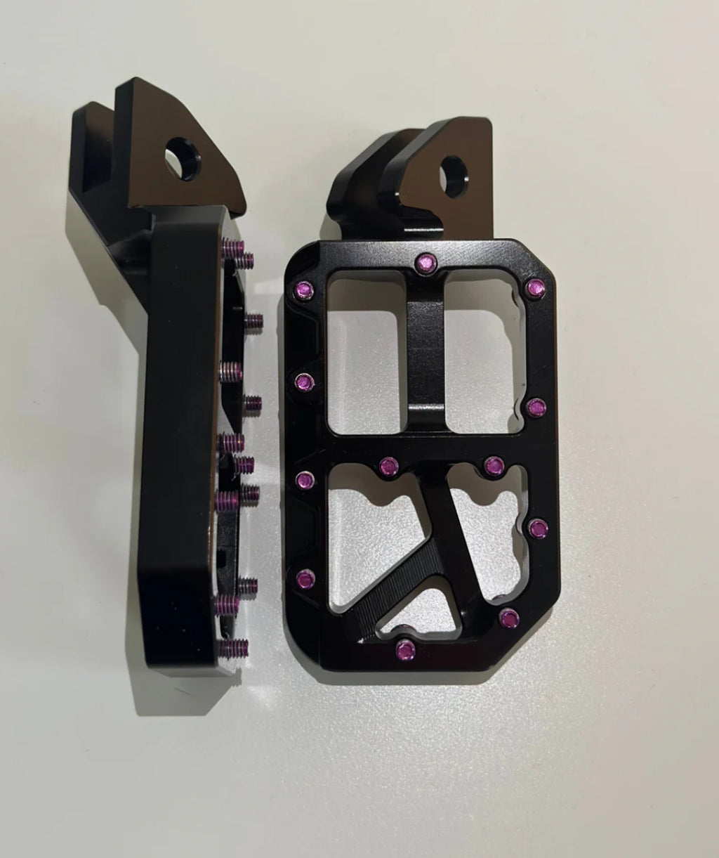 Black foot pegs