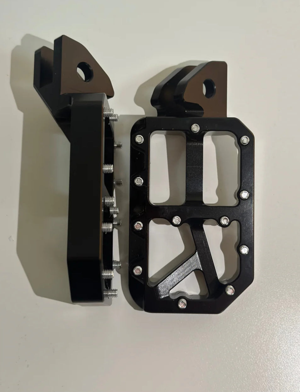 Black foot pegs
