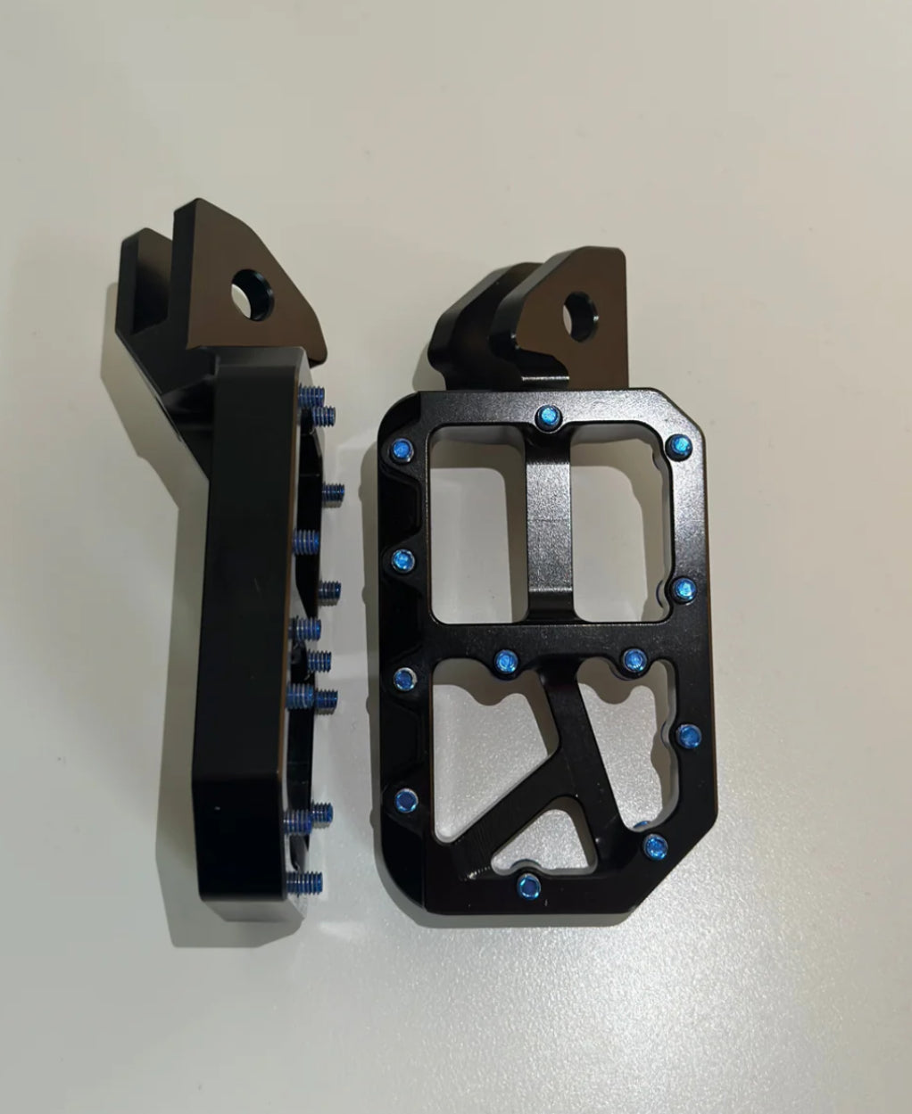 Black foot pegs